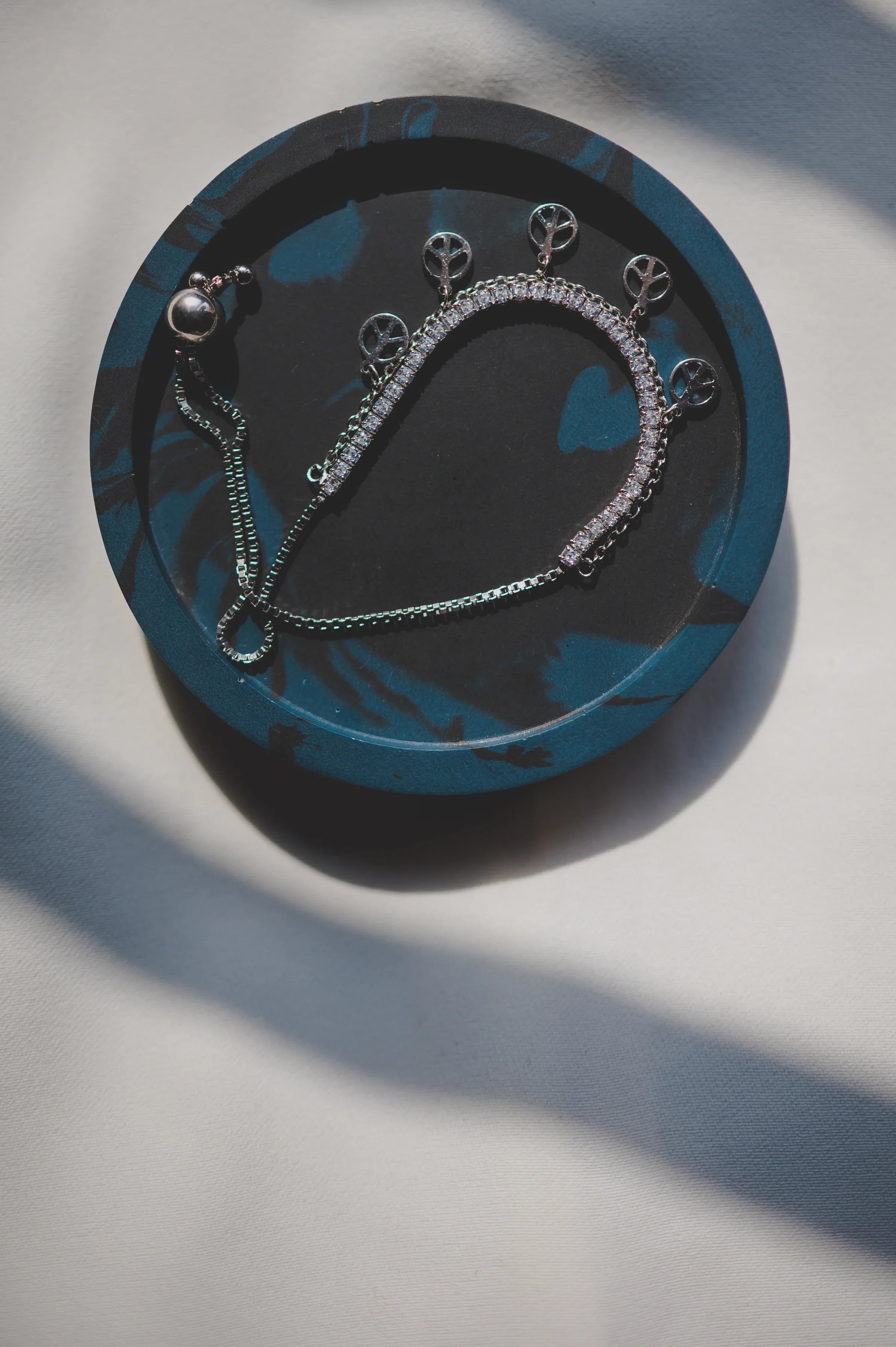 Tennis Bracelet Attached with Peace Charms - SanskrutiHomes 