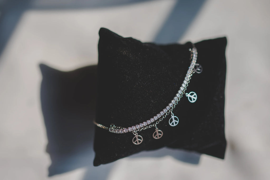 Tennis Bracelet Attached with Peace Charms - SanskrutiHomes 