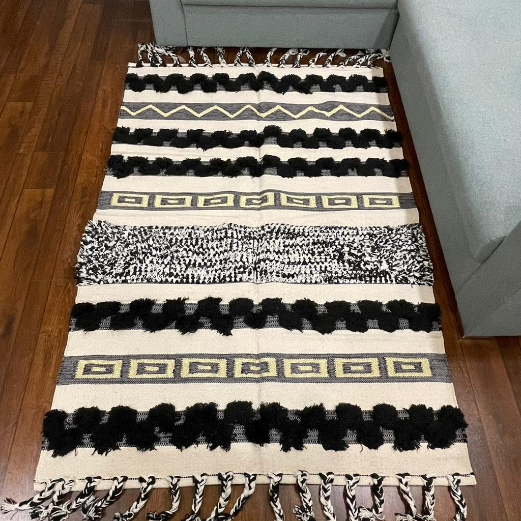 Hand-weaved Black Ruffle Cotton Rug with zari work - SanskrutiHomes 